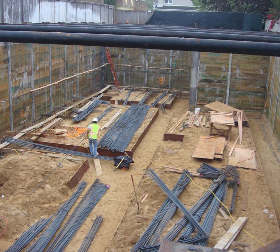 Excavated strip footings are ready for steel reinforcement. Iron men Move in ! Pacificland Constructors