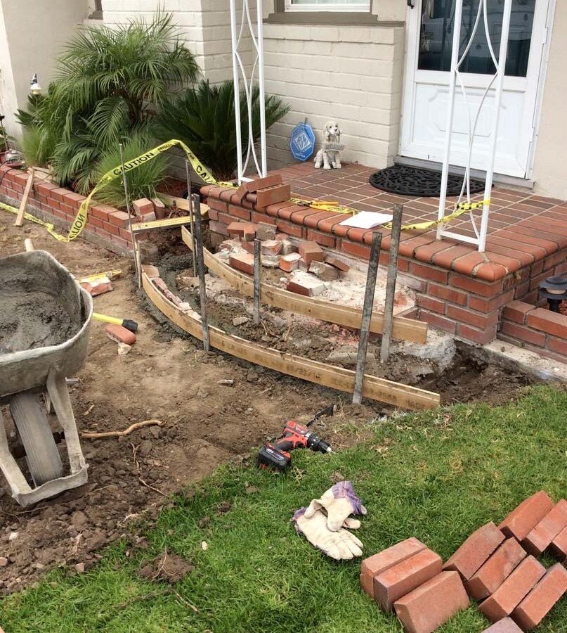 Construction of the new brick front porch landing. Pacificland Constructors