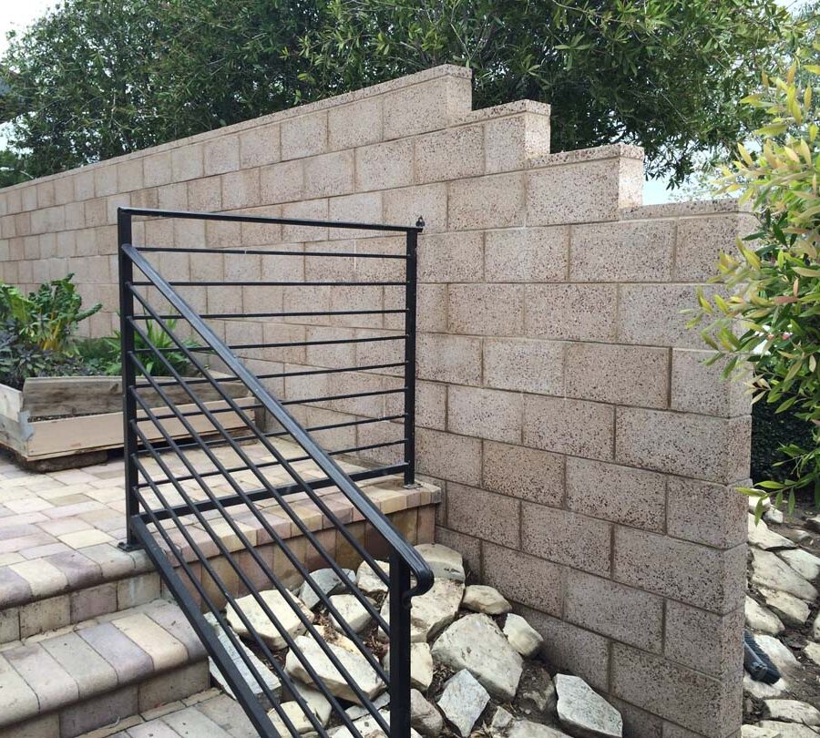 New tan colored burnished freestanding wall for a backyard.