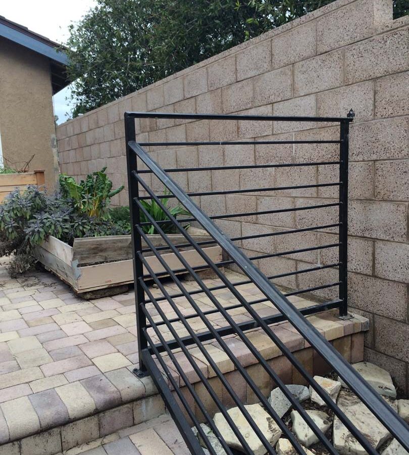 New tan colored burnished freestanding wall for a backyard.