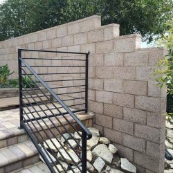 New tan colored burnished freestanding wall for a backyard.