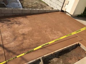 New CMU courtyard in Cerritos, CA. This will have a colored stucco coat so it contrasts with the stamped colored concrete.