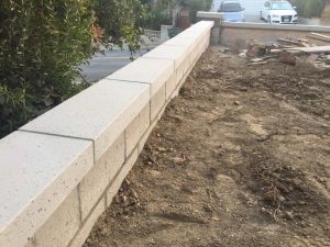 New concrete precast wall cap for a planter a frontyard.