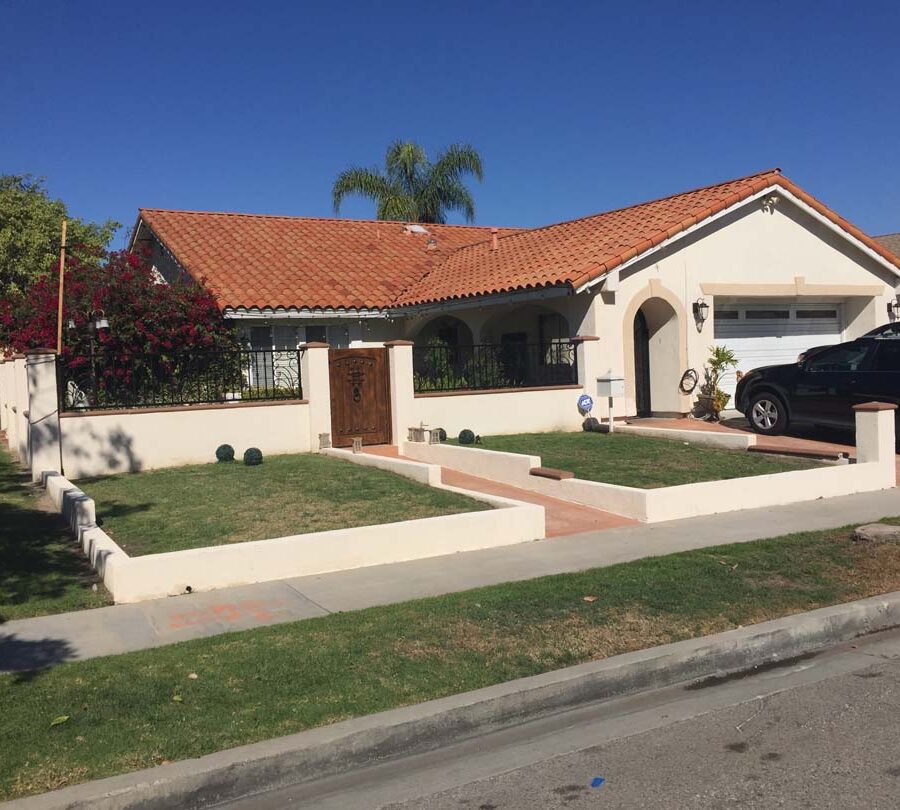 New CMU courtyard in Cerritos, CA with a colored stucco coat so it contrasts with the stamped colored concrete.