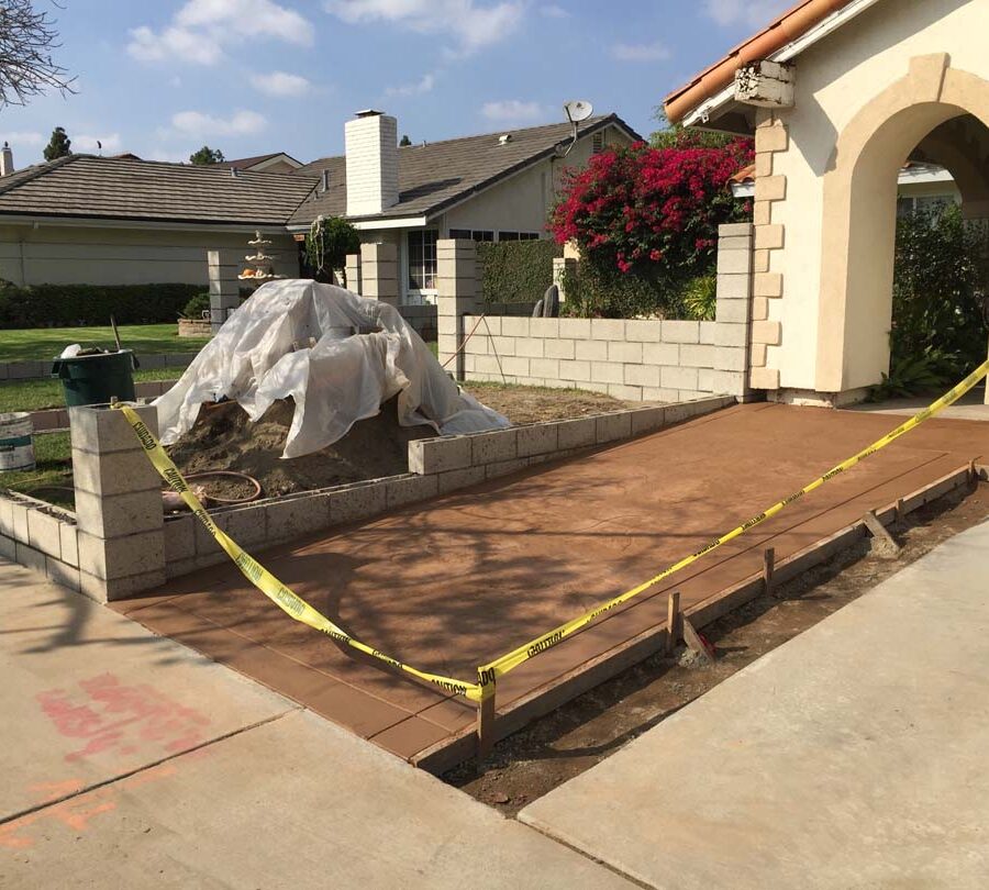 New CMU courtyard in Cerritos, CA. This will have a colored stucco coat so it contrasts with the stamped colored concrete.