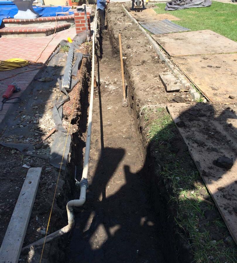 New strip footing for a new slump block wall for a home’s side yard. Iron-men will now tie steel reinforcement for this wall. Pacificland Constructors