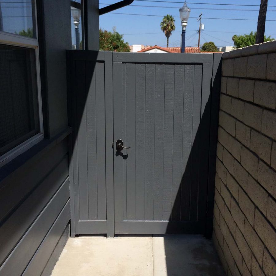 New slump block CMU wall with a wall cap for a home’s backyard. This is a great option to raise the value of your home and create more private living space. It also has access to the front yard making it convenient to store and haul out trash bins. Pacificland Constructors