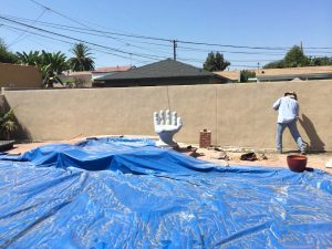 The neighbor of our client wanted us to apply colored stucco to his side of the wall. Our crew was happy to do that for them. Pacificland Constructors