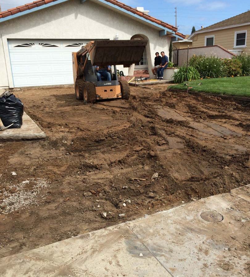 Demolition of outdated driveway.