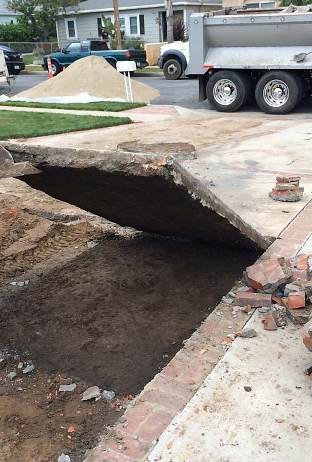 Demolition of outdated driveway.