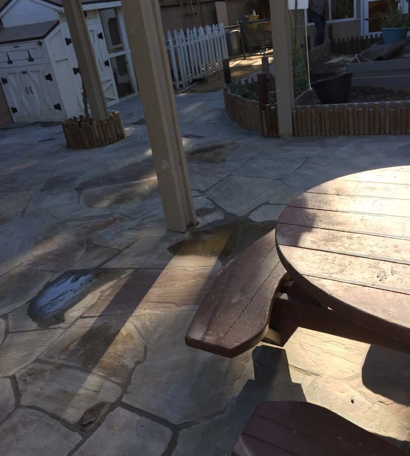 New flagstone patio gives the home a relaxing theme.