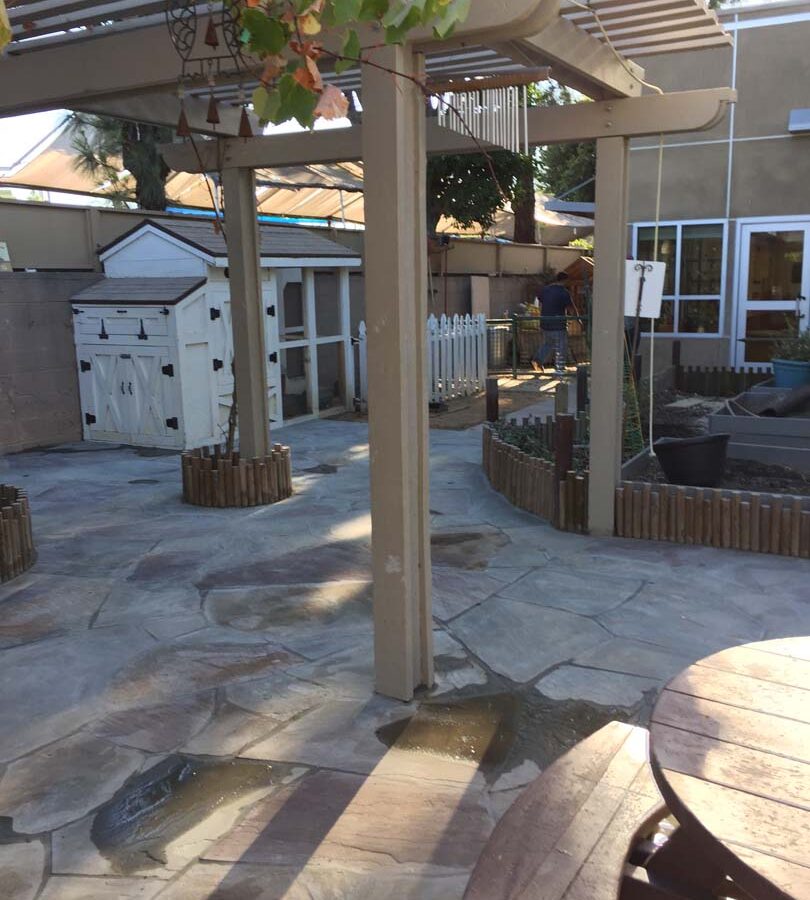 New flagstone patio gives the home a relaxing theme.