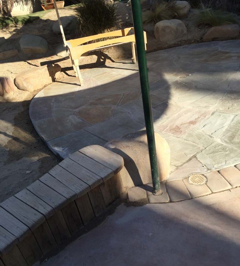 Flagstone patio gives the home a relaxing theme. Pacificland Constructors