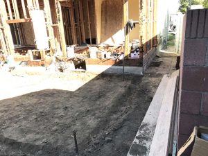 Grading for a new home addition. Pacificland Constructors