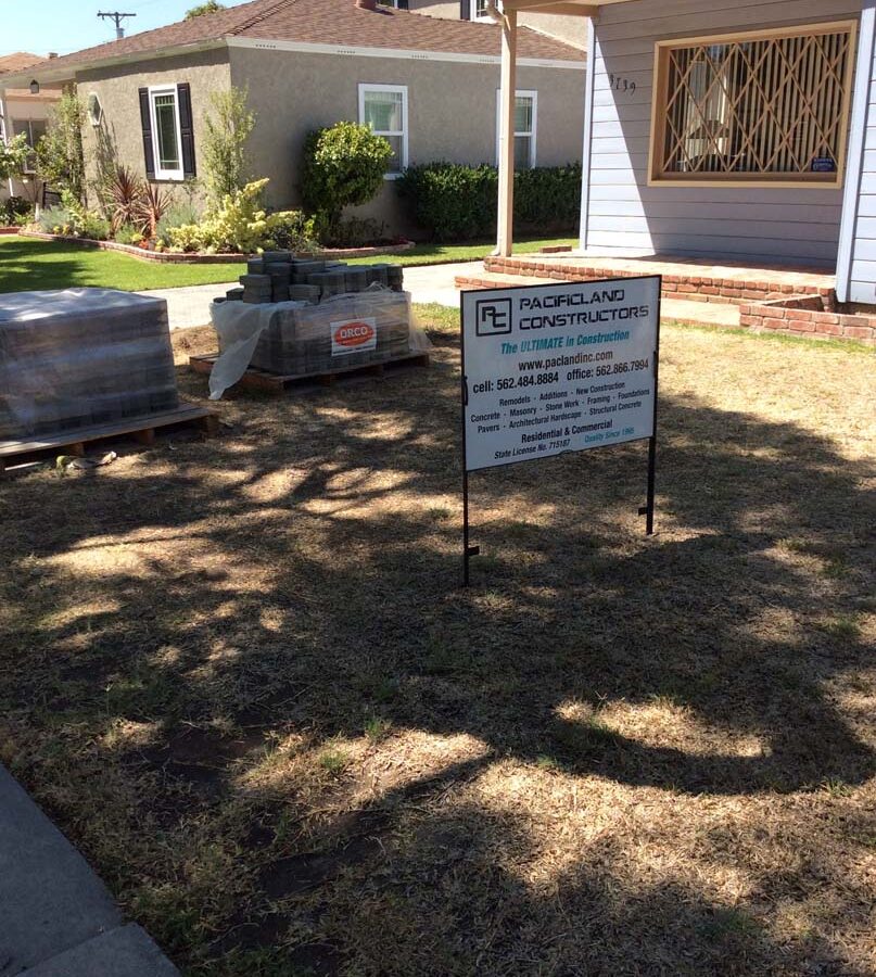 Sign of Pacificland Constructors displayed in the front yard of our projects. Pacificland Constructors