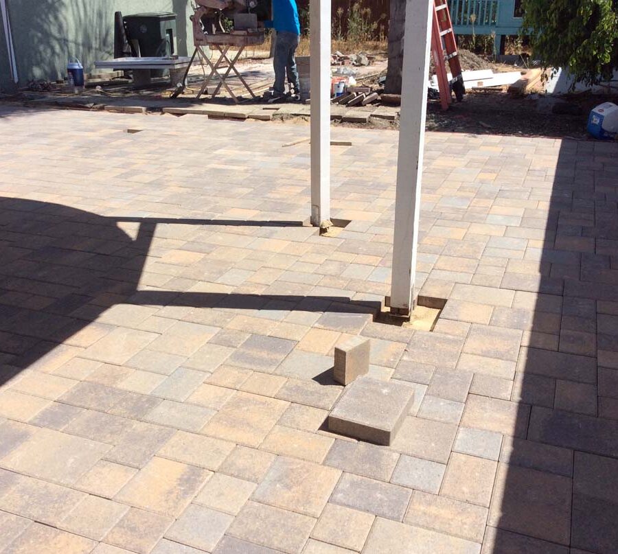 New paver concrete backyard patio for a residential project.