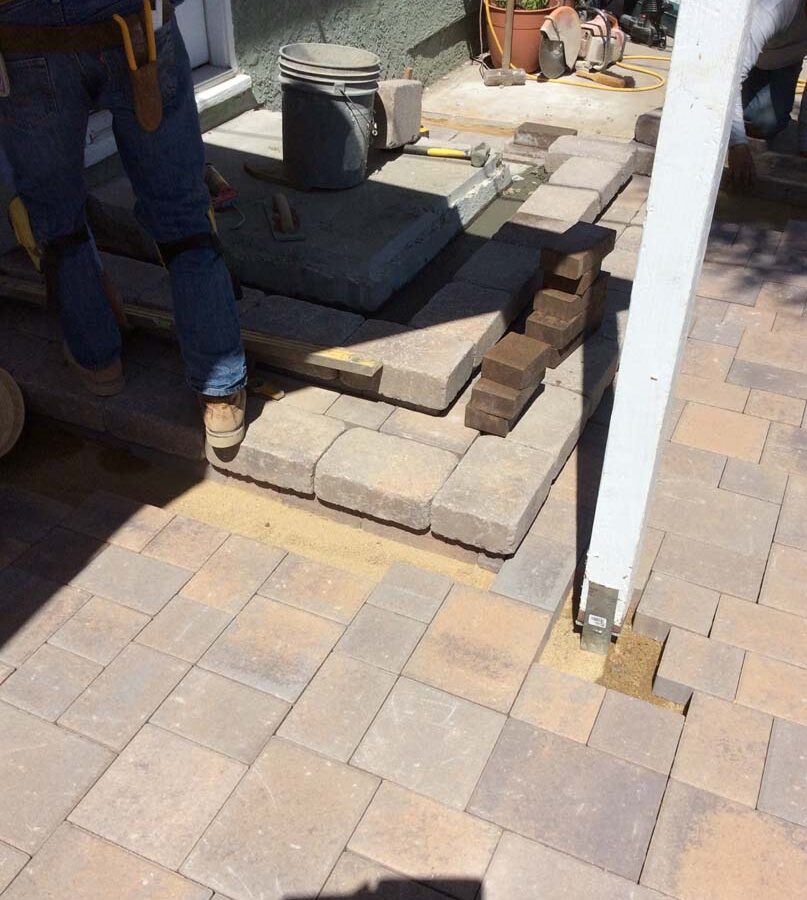 Construction of a new backyard porch landing.