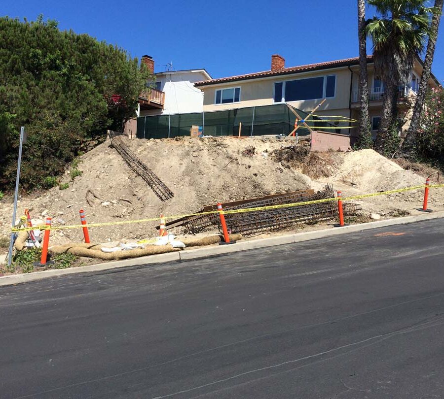 Preparing the area that will serve as the new retaining wall’s foundation. Pacificland Constructors