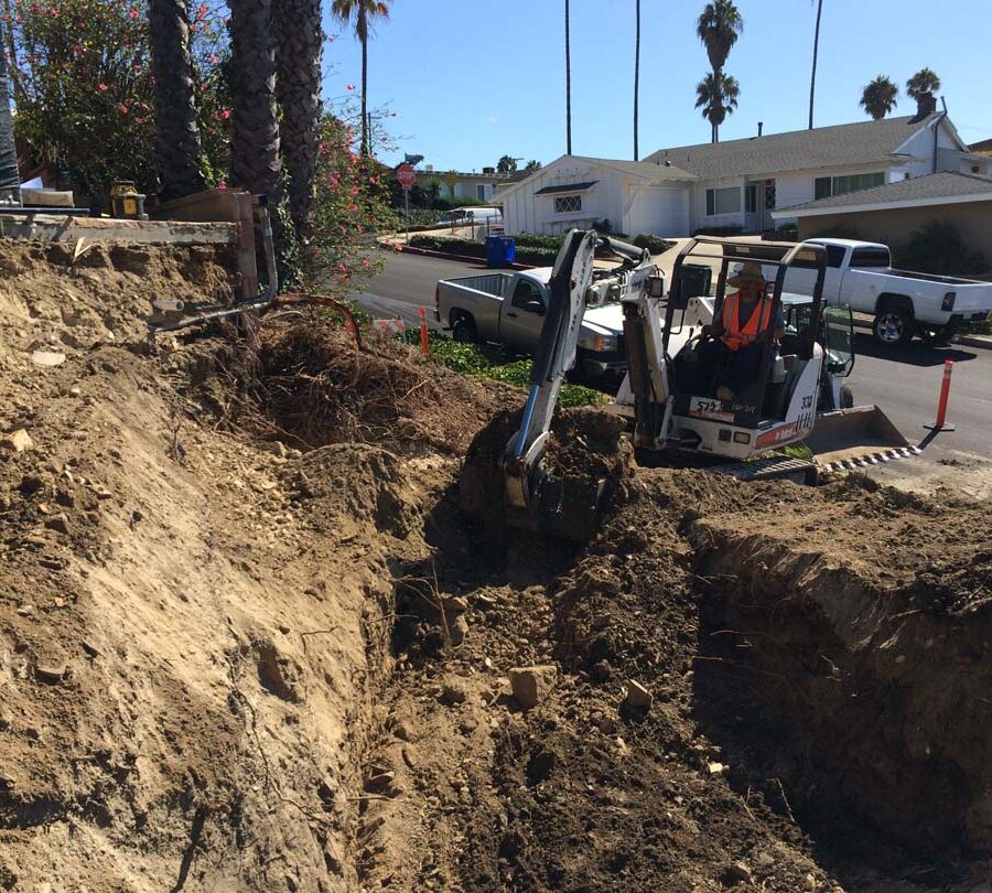 Preparing the area that will serve as the new retaining wall’s foundation. Pacificland Constructors