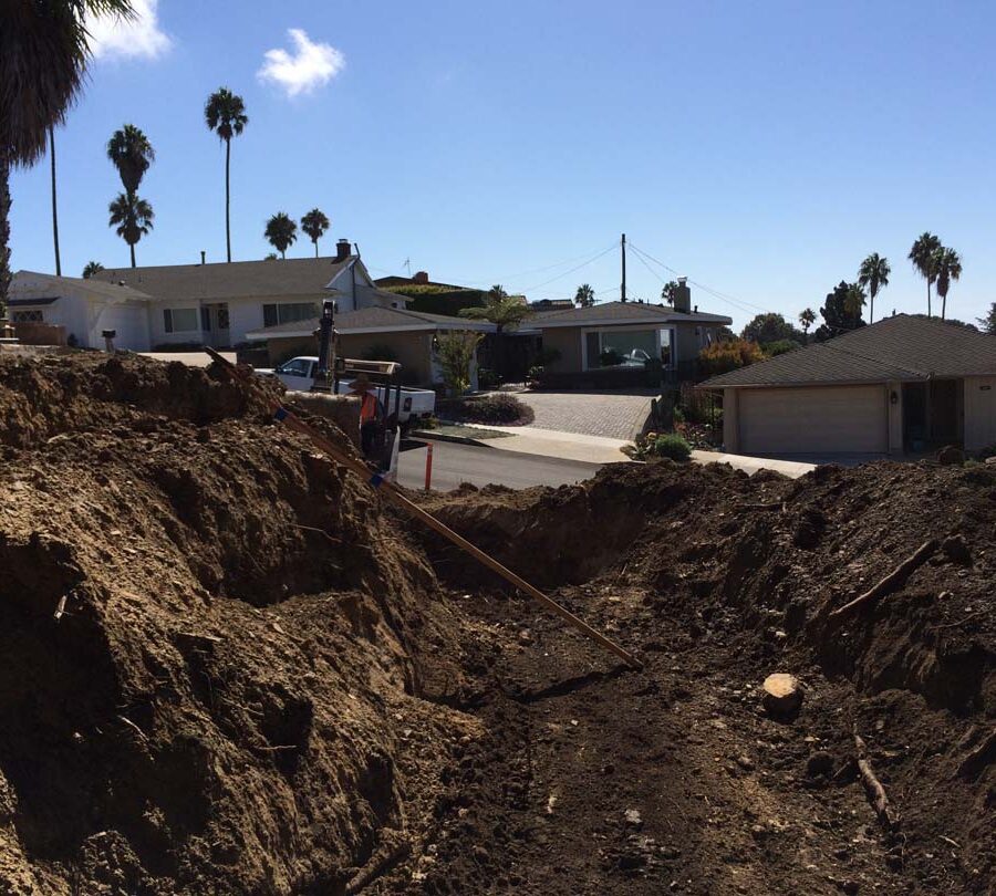 Preparing the area that will serve as the new retaining wall’s foundation. Pacificland Constructors