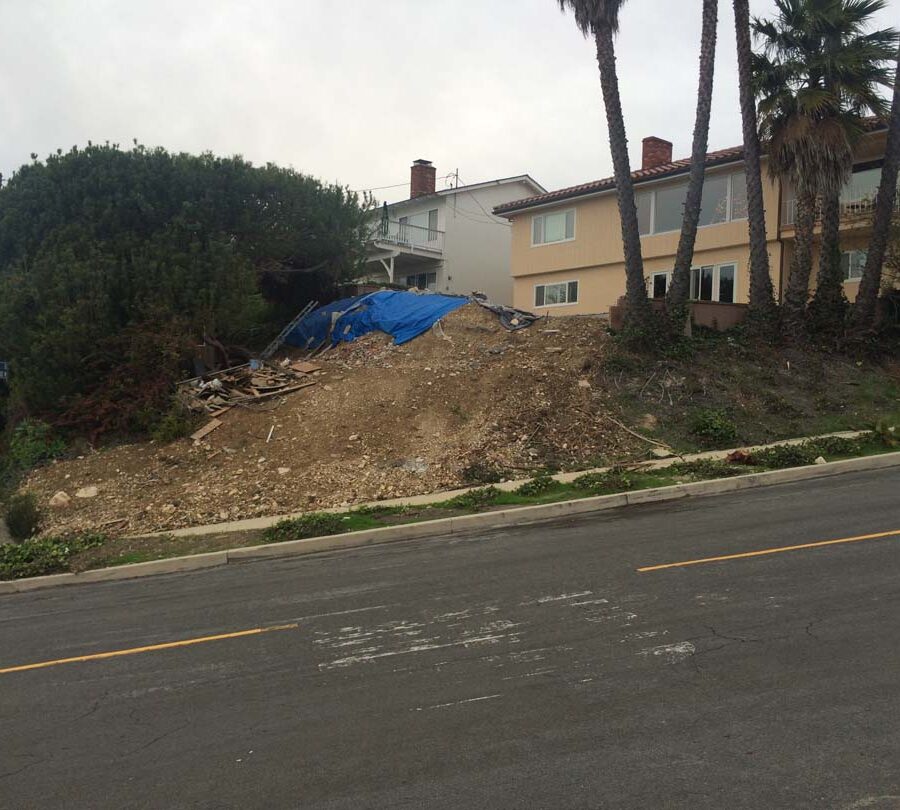 The previous contractor who did work on this home threw all the debris of the pool construction onto the hillside. We were called to clean their work and build a retaining wall to increase flat space by the pool deck.