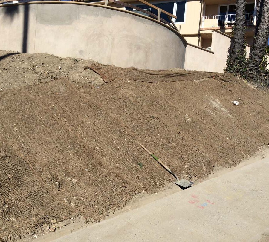 New erosion control applied over the soil before installing a water drop system. Pacificland Constructors