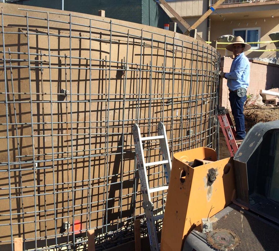 Martin, founder of Pacificland, tieing steel rebar reinforcement for a retaining wall. Retaining walls allow you to use more of your Brick work is a great option to raise the value of your home. Pacificland Constructors