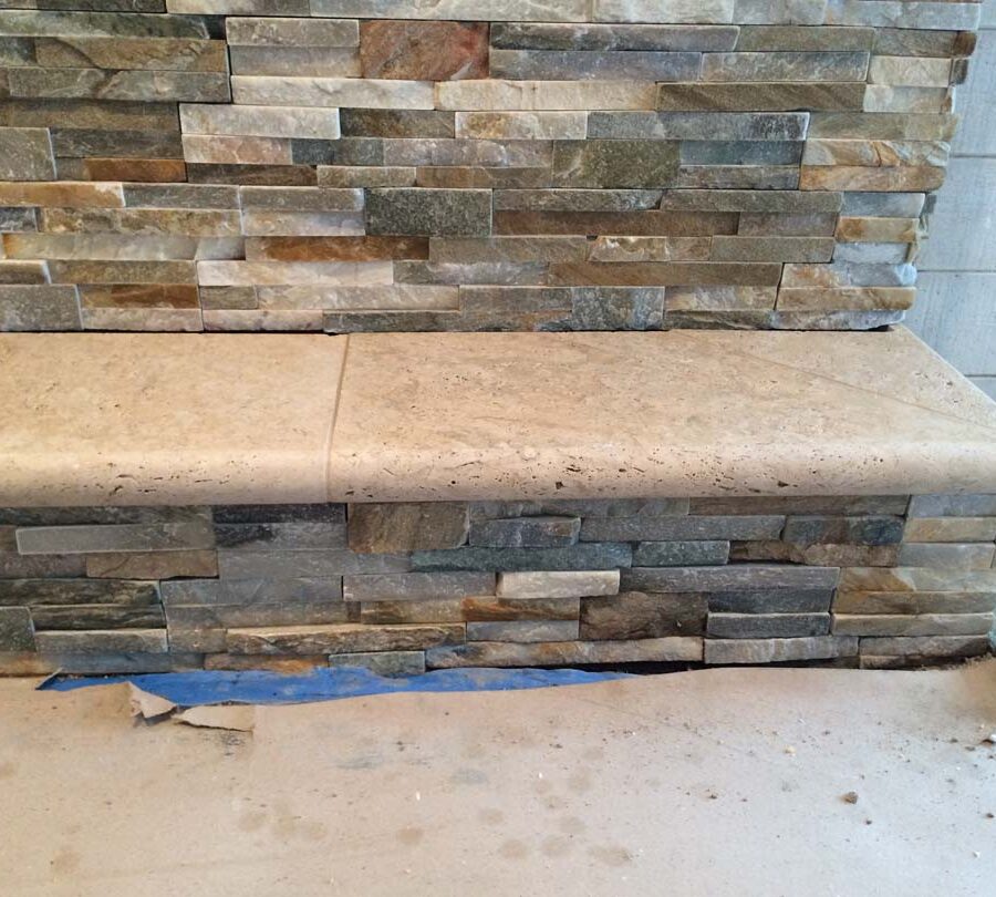 Using concrete precast with bull-nosed edge is a great choice for the outer hearth of a fireplace. Pacificland Constructors