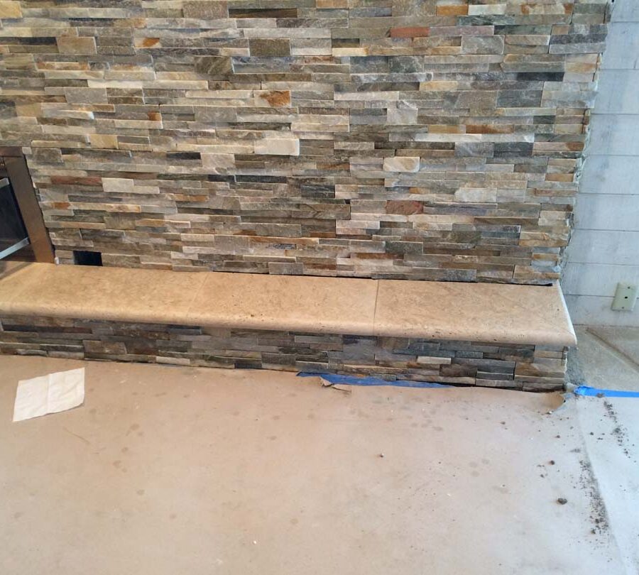 Using concrete precast with bull-nosed edge is a great choice for the outer hearth of a fireplace. Pacificland Constructors