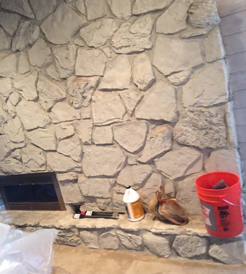 Outdated chimney veneer that was demolished and replaced with new modern style stone veneer. Pacificland Constructors