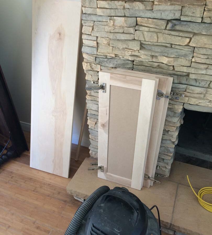 Construction for a stone veneer over the existing fireplace to create a vintage theme for the home. Pacificland Constructors