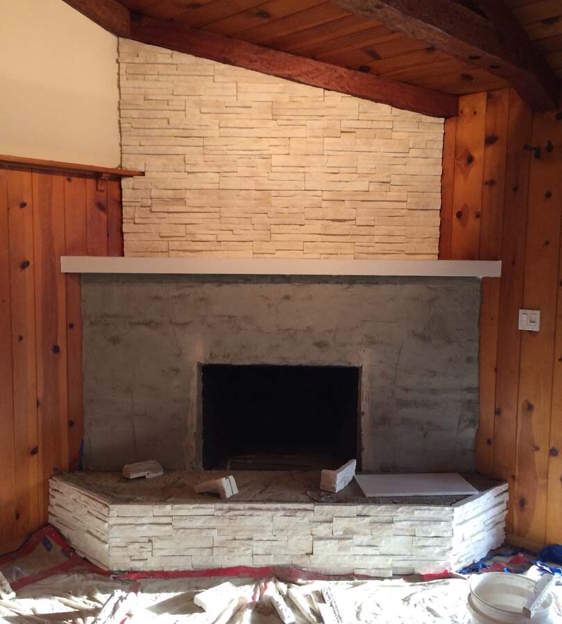 Fireplace remodel prior to installing a marble/granite outer hearth and stone veneer. Pacificland Constructors