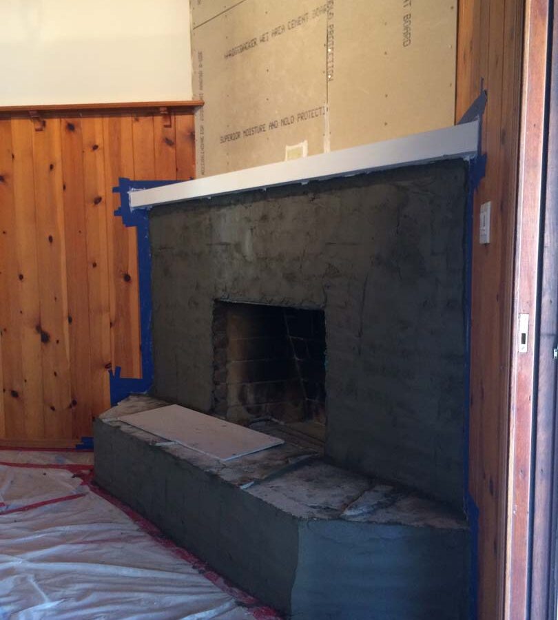 Fireplace remodel prior to installing a marble/granite outer hearth and stone veneer. Pacificland Constructors