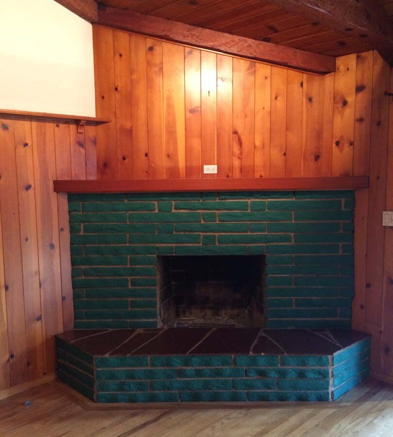 Old fireplace that was remodeled by Pacificland Constructors. It was sealed with a motar coating and reinforcement for new stone veneer.