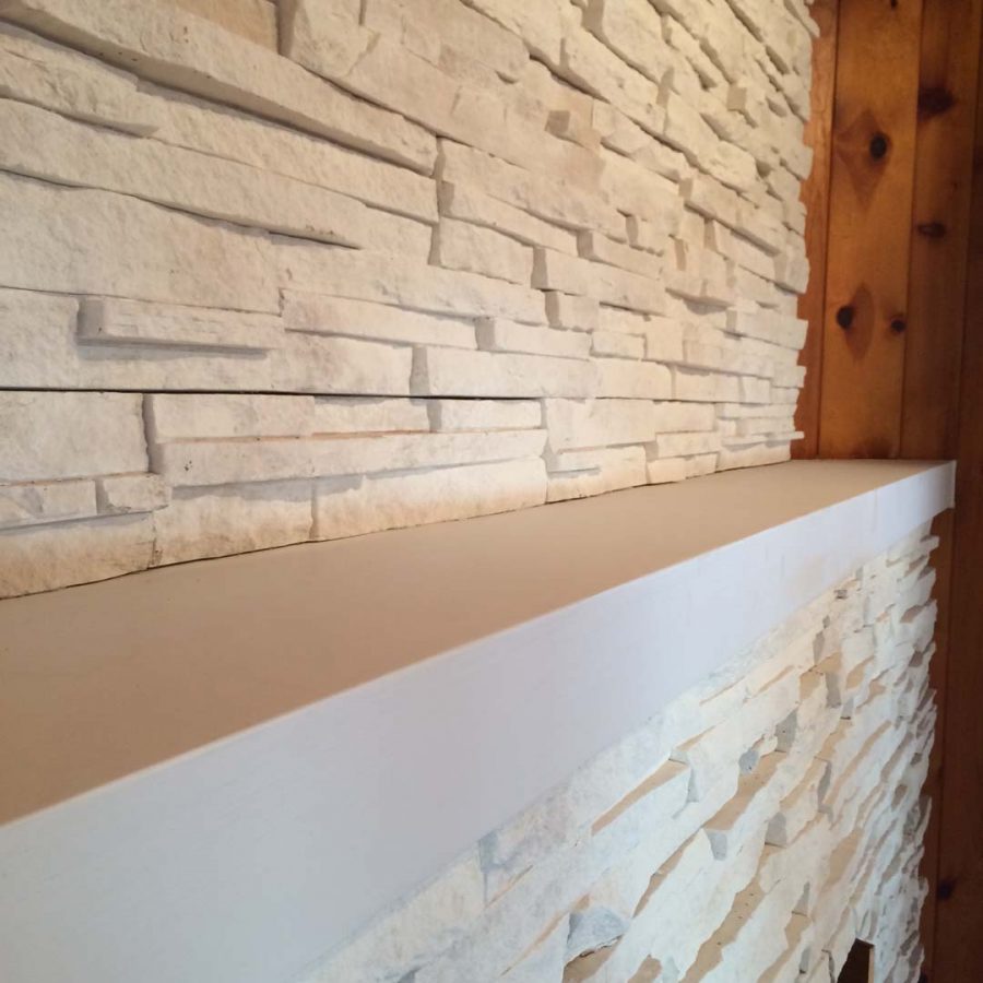 This white stone veneer is a great decoration for this living room area because it sets a relaxing and modern theme. Pacificland Constructors