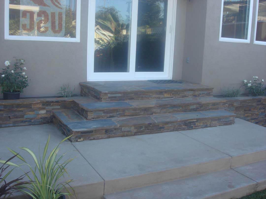 Stone Veneer Contractor Masonry Concrete Block Pavers New Stone Veneer On The Face Of Concrete Steps Pacificland Constructors
