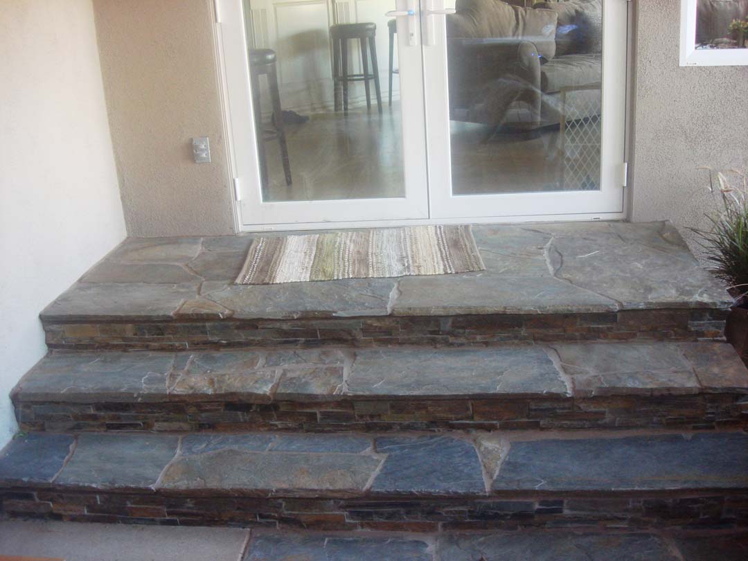 Stone Veneer Contractor Masonry Concrete Block Pavers New Stone Veneer On The Face Of Concrete Steps Pacificland Constructors