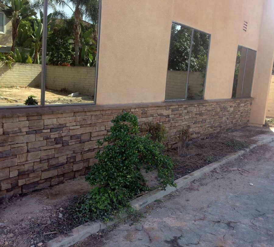 Stone veneer at the exterior of a commercial building. Pacificland Constructors