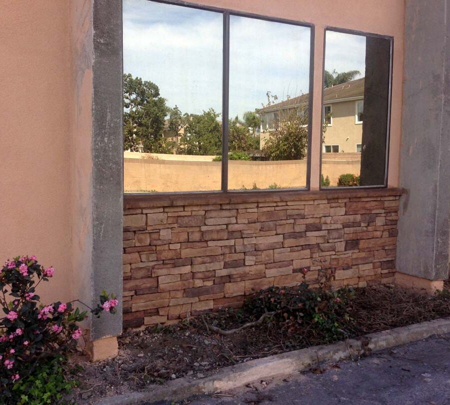 Stone veneer at the exterior of a commercial building. Pacificland Constructors