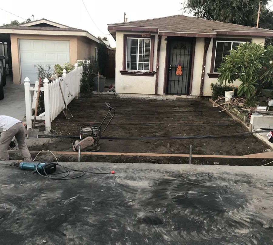 Rebar being placed on recently demolished driveway. Pacificland Constructors