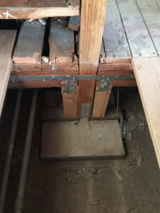 New foundation pad for a beam post and floor posts. Pacificland Constructors