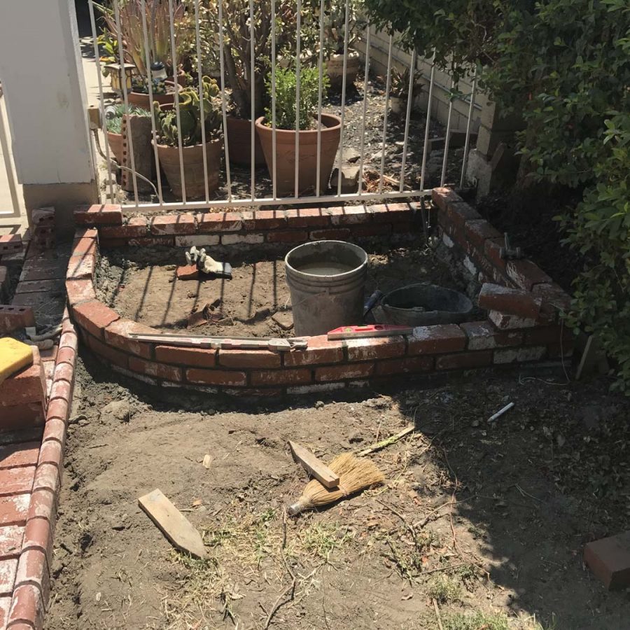 Construction of a new front yard brick planter. Pacificland Constructors