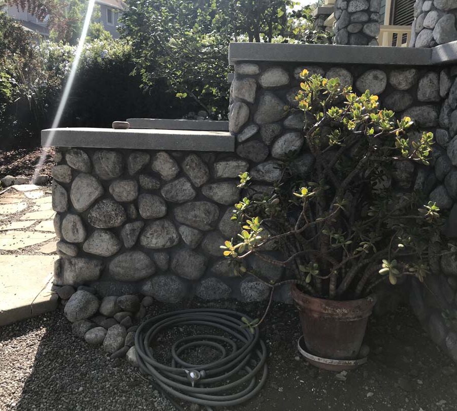 Restored Front porch with new stone veneer. Pacificland Constructors