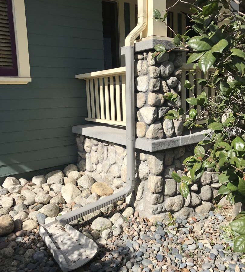 Restored Front porch with new stone veneer. Pacificland Constructors