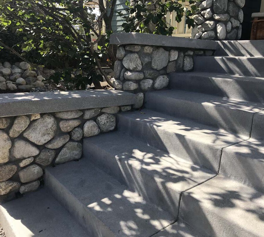 New front yard stone and concrete work for the entrance of a home in Eagle Rock, Los Angeles, CA. Joints are saw cut to control cracks. Pacificland Constructors