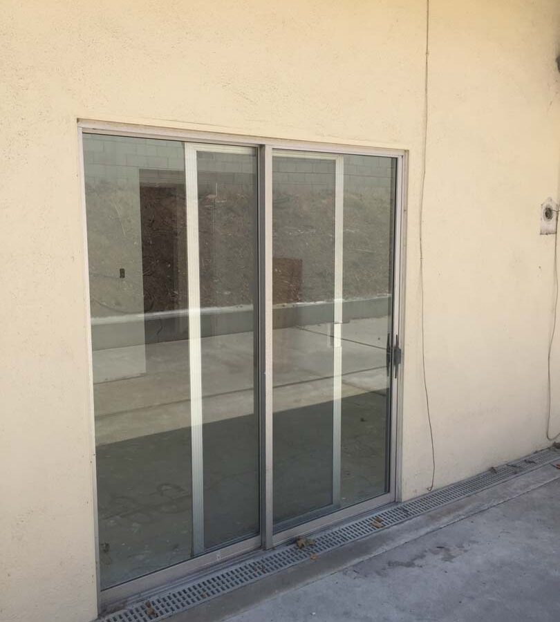 Old existing door that will be demolished and replaced with a new glass door and glass curtain walls. Pacificland Constructors