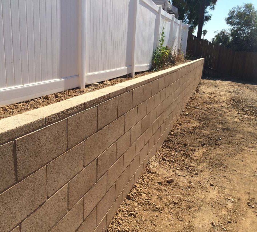 New tan precision block retaining wall. Pacificland Constructors