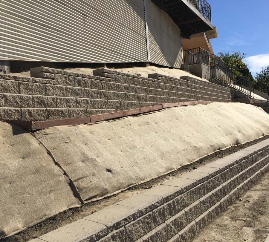 New walls for an uphill property in La Habra. Burlap is applied onto the soil. Pacificland Constructors