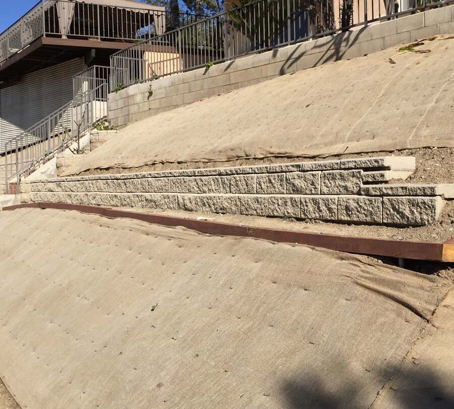 New walls for an uphill property in La Habra. Burlap is applied onto the soil. Pacificland Constructors