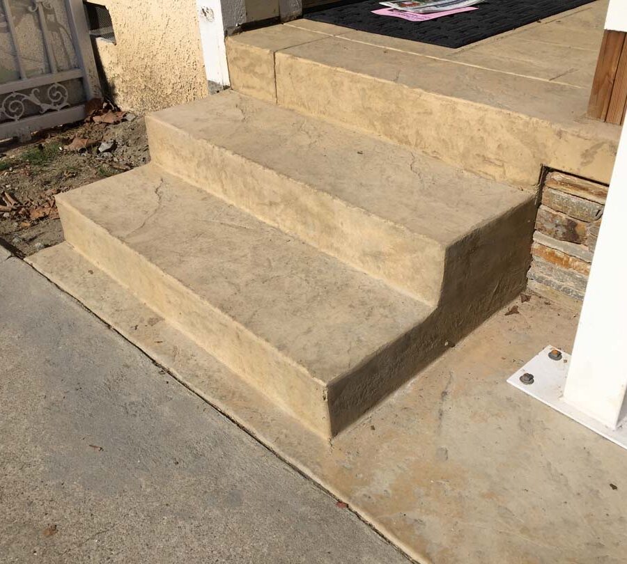 Colored stamped concrete with handmade joints. The steps have the stamped texture. Pacificland Constructors